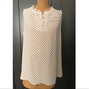 Cream ruffle neck blouse with black polka dots